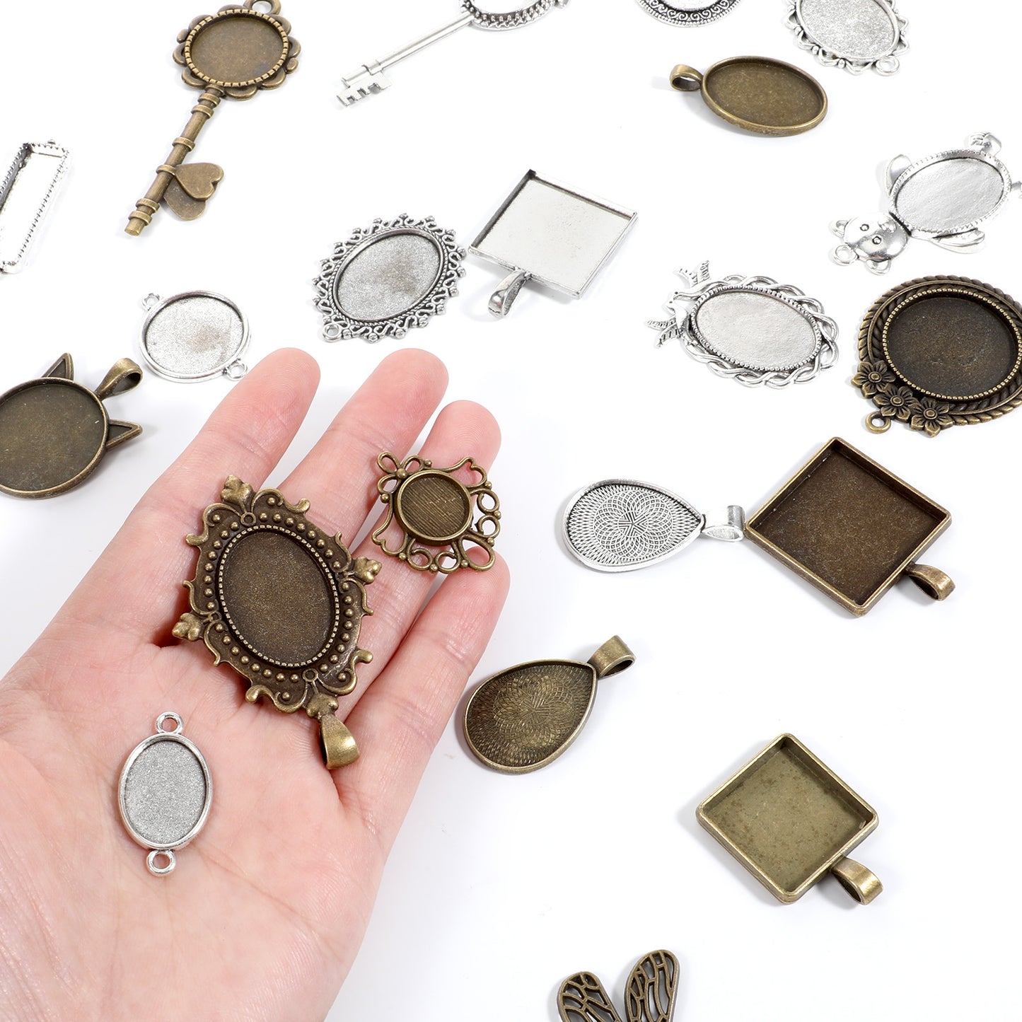 100G Random Metal Tray: Antique Silver & Bronze Bezel Necklace Blank Charms, Pendant Bezels for Resin Jewelry Making with Glass Cabochons, Bails, Ring Blanks, Jewelry Bails & Findings(Blind Box)